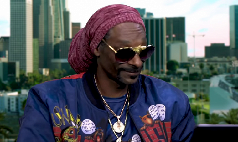 Рэпер Snoop Dogg понесет факел на открытии Олимпиады